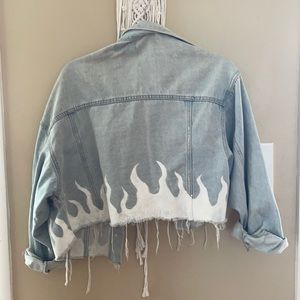 Moderately worn, light weight denim jacket.